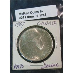 1246. 1967 Canada Silver Dollar. BU Head Side Toned.