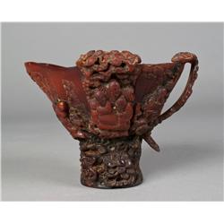 A Fine Chinese Carved Rhino Horn Libation Cup