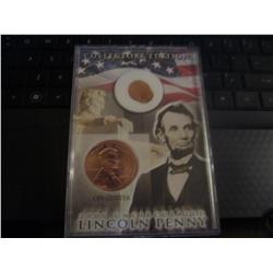 2000 off center lincoln penny rare in hard plastic case