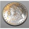 Image 1 : 1885o bu + Morgan Silver Dollar
