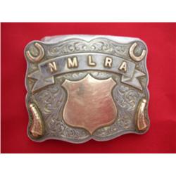 Intricately engraved sterling and 10k gold belt buIn the upper corners are gold horseshoes, in  the 