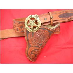 Tooled belt and holsterfinely tooled made by gen city saddlery  Laramie, Wyoming.   A.S. Mysong