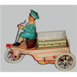 Toy - Figure in Three Wheel Cart