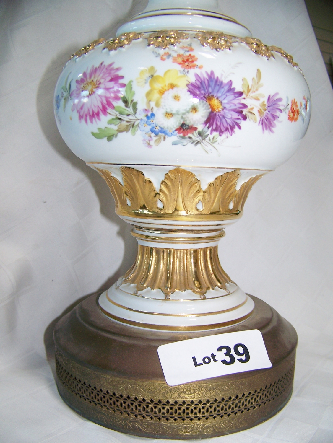 Antique porcelain lamp on brass base w/ hand painted flowers w/ brass