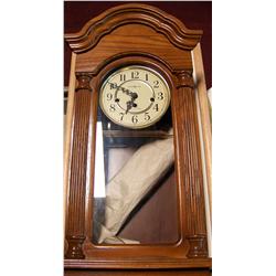 HOWARD MILLER CHIMING WALL CLOCK
