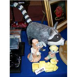 Four Piece Lot incl. Racoon Statue, 2 Warner Bros. and Train Ceramics Figurines.
