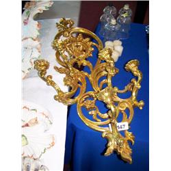 Gold Colored Candelabra Wall Fixture With Candles.