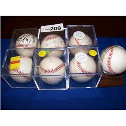 (7) Piece Celebrity & Athlete Hand signed Baseball's all in protective cases.