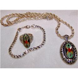 A Sterling Silver necklace, Bracelet, Ring & Pendant The Jewelry weighs 82.8 Grams