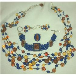 A Sterling Silver jewelry Suite inclu: necklace, bracelet, earrings &ring set w/ lapis, amber