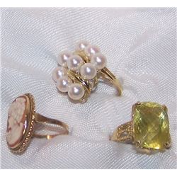 Lot of Three Ladies 14K Gold Rings set w/ various stones as shown.. The rings weigh 16.2 Grams