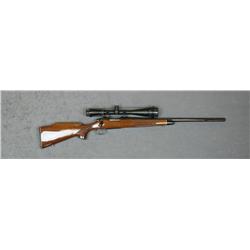 Remington Model 700 bolt-action rifle,  .22-250 Rem. cal., 24” round barrel, blue  finish, jeweled b
