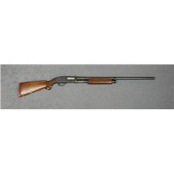 J.C. Higgins Model 20 pump shotgun, 12 gauge,  full choke, 28” barrel, blue finish,  checkered wood
