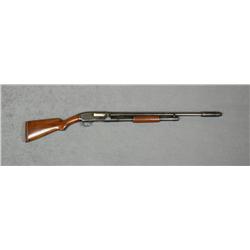 Winchester model 12, 16ga, pump-action  shotgun showing raised milled rib and added  Cutts compensat