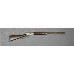 Winchester Model 1886 lever action rifle,  45-70 cal., 26” round barrel, patina finish,  wood stocks