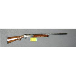 Remington Model 1100 semi-auto shotgun, 12  gauge, 28” ventilated rib barrel, blue  finish, checkere