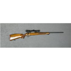 Sako bolt-action rifle, .375 Mag. cal., 23”  round barrel, black finish, checkered wood  stock, #587