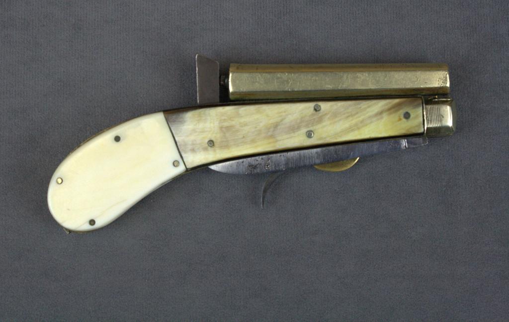 Antique Knife pistol, .22 cal., 31/2” barrel, two folding knife blades