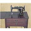 Image 1 : Winchester sewing machine in its original  cabinet. Cabinet is early American style and  measures ap