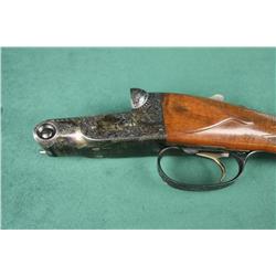 Leather cased Parker reproduction by  Winchester, 28 gauge, modified and improved  cylinder chokes, 