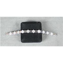 Diamond Bracelet approx. .70 carat set in  14kt white gold. Est. $750-$1,500.