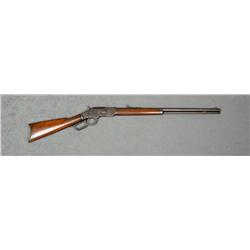 Winchester Model 1873 lever action rifle, .32  WCF cal., 24” round barrel, wood stocks,  #310654B. T