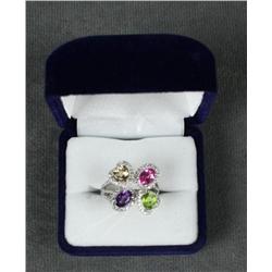 One 14k white gold ring set with multicolored  gems and diamonds. Est. $1,500-$2,000.