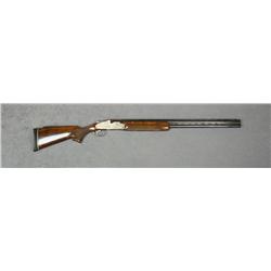 Weatherby Athena grade O/U shotgun, 12 gauge,  30” ventilated and ported barrels, blue  finish, engr