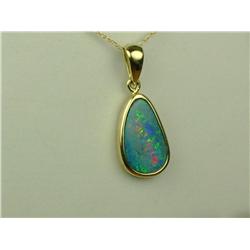Very fine quality 14 karat yellow gold ladies  custom made pendant bezel set with a very  fine play 