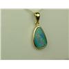 Image 1 : Very fine quality 14 karat yellow gold ladies  custom made pendant bezel set with a very  fine play 