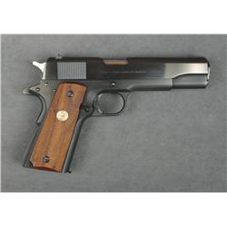 Colt Government Model MK IV/Series 70  semi-auto pistol, .45 cal., 5” barrel, blue  finish, checkere