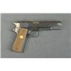 Image 1 : Colt Government Model semi-auto pistol, .45  cal., 5” barrel, blue finish, checkered Colt  medallion
