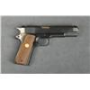 Image 2 : Colt Government Model semi-auto pistol, .45  cal., 5” barrel, blue finish, checkered Colt  medallion