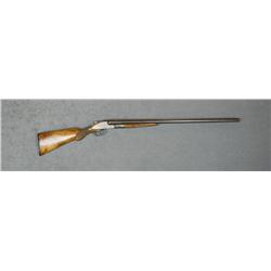 L.C. Smith SxS concealed hammers shotgun, 12  gauge, 30” barrels with Damascus pattern,  brown and c