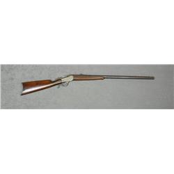 Winchester Model 1885 low wall single shot  rifle, .32 WCF cal., 28” octagon barrel, blue  and case 