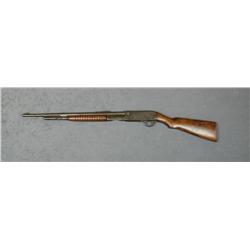 Remington pump action rifle, .30 Rem. cal.,  22” round barrel, blue finish, wood stocks,  #C54013. T