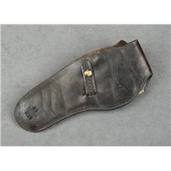 Basketweave leather holster for a 5-1/2” SAA  revolver made by Idaho Leather Co. in overall  good co
