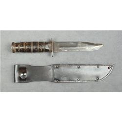 U.S. Military style K-Bar knife with leather  sheath in overall fair condition.  Est.:   $75-$150.