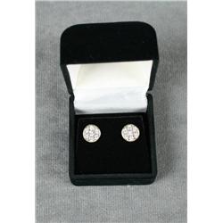 Diamond earrings approx. .50 carat TW, set in  14kt yellow gold. Est. $100-$200.