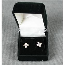 Diamond Earrings set in yellow gold. Est.  $100-$200.