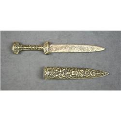 Ornate cast metal dagger and sheath of  unknown vintage, approx. 11” overall with an  approx. 7” bla