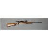 Image 1 : Ruger Model 77 bolt-action rifle, 7mm Rem.  Mag. cal., 24” round barrel, blue finish,  checkered woo