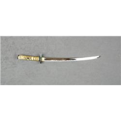 Short reproduction Samurai sword and  scabbard; blade is very good, grip shows faux  ray skin, cord 