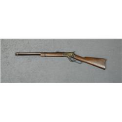 Colt Burgess Model lever action SRC, .44-40  cal., 20” barrel, blue finish, wood stocks,  #1404. Thi
