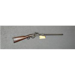 Cosmopolitan percussion SRC, .52 cal., 20”  barrel, blue finish, wood butt stock, #693.  This gun is