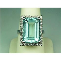 Spectacular 14 karat white gold ladies estate  ring set with a very large emerald cut  green/blue Aq