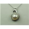 Image 1 : Gorgeous 14 karat white gold ladies pendant  set with a center white freshwater Pearl of  approx. 9.