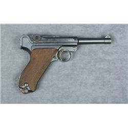 German Luger by DWM semi-auto pistol, 9mm  cal., 4” barrel, military mat blue finish,  checkered woo