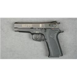 Smith & Wesson Model 910 DA semi-auto pistol,  black finish, composite frame, 9mm cal., 4”  barrel,