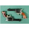 Image 2 : Cased pair of Italian-made copies of the Colt  SAA revolver, including a wood handled  screwdriver, 